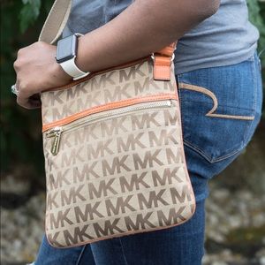 Micheal Kora monogram crossbody bag